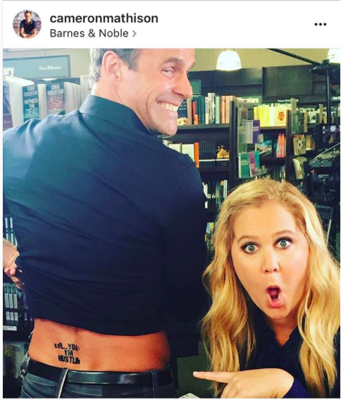 The Girl and the Entertainment Tonight Host with the Back Tattoo